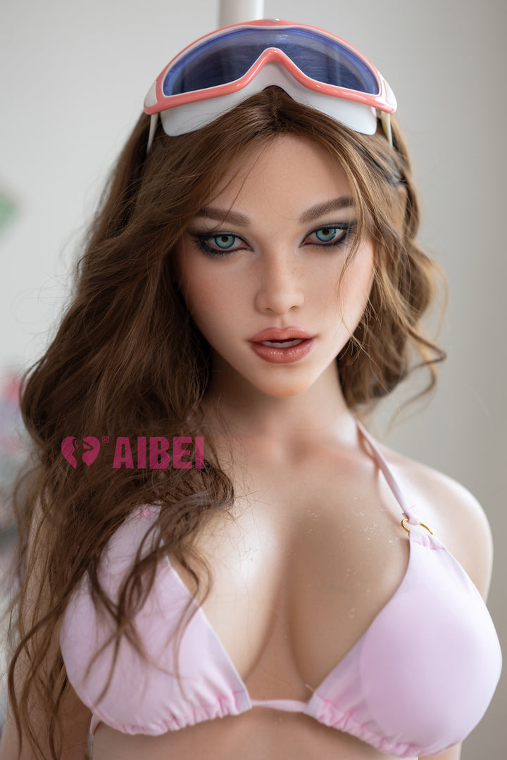 Aibei Doll 158 cm F Silicone – Aria wearing a light pink bikini and ski goggles on her head, featuring lifelike facial details and realistic silicone skin texture.