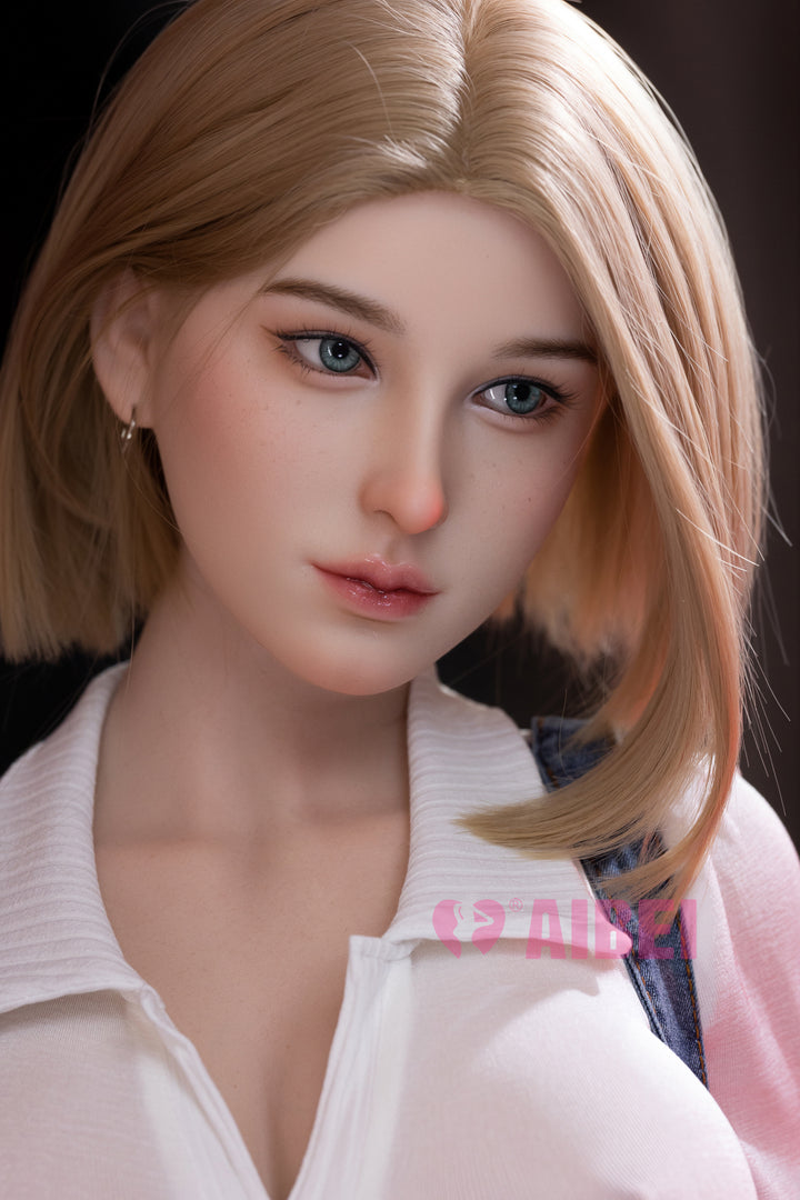 Close-up of Scarlett’s face, featuring realistic skin texture, soft blonde hair, and subtle makeup.