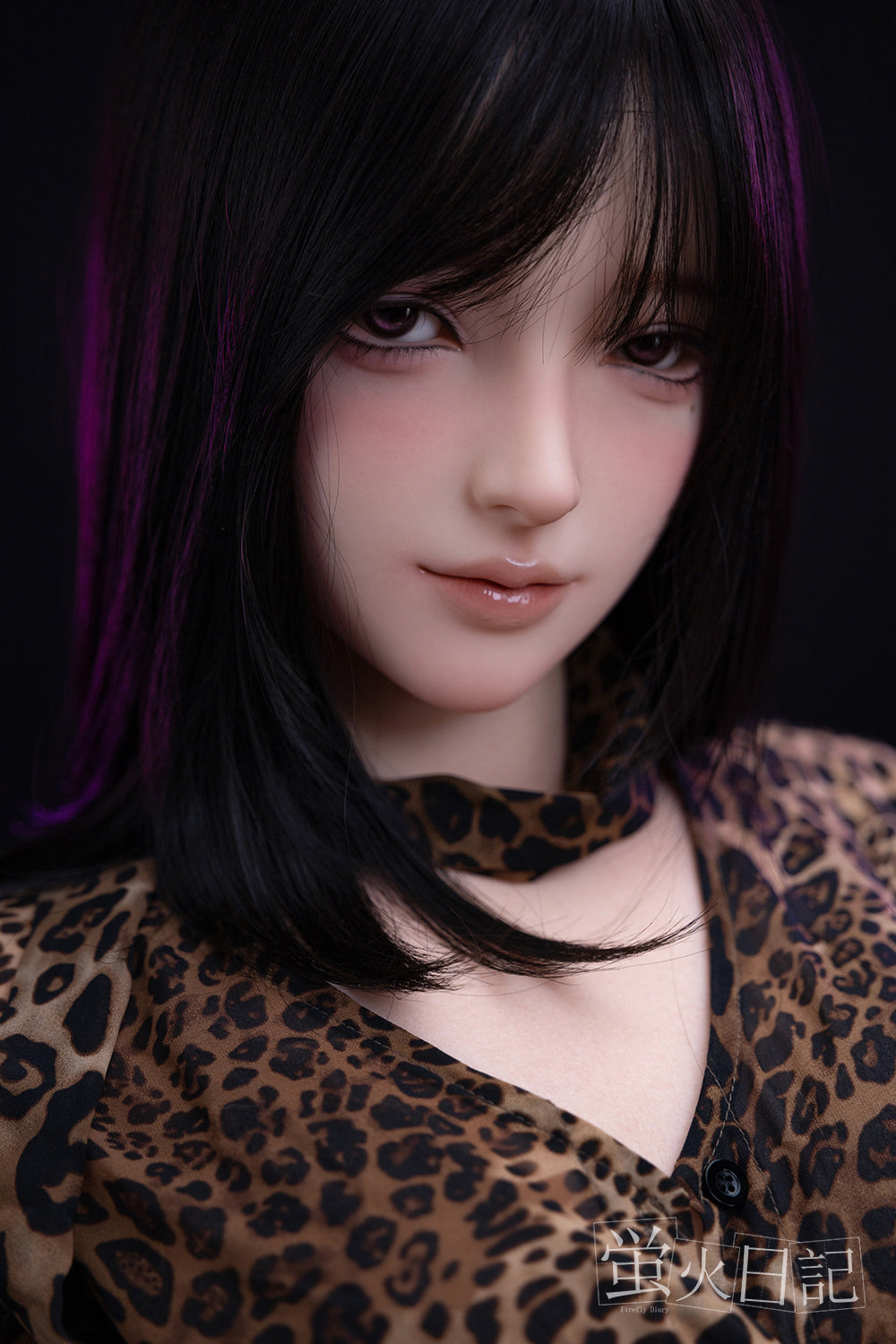 Close-up of Firefly Diary Doll 161 cm Silicone – Linglong with shoulder-length black hair, soft makeup, and wearing a leopard-print top, showcasing her realistic facial details.
