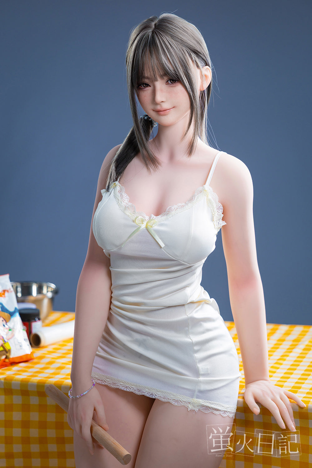 Firefly Diary Doll Qiandao – 159 cm silicone love doll with soft facial features, dressed in cream outfit, posed in realistic home setting.