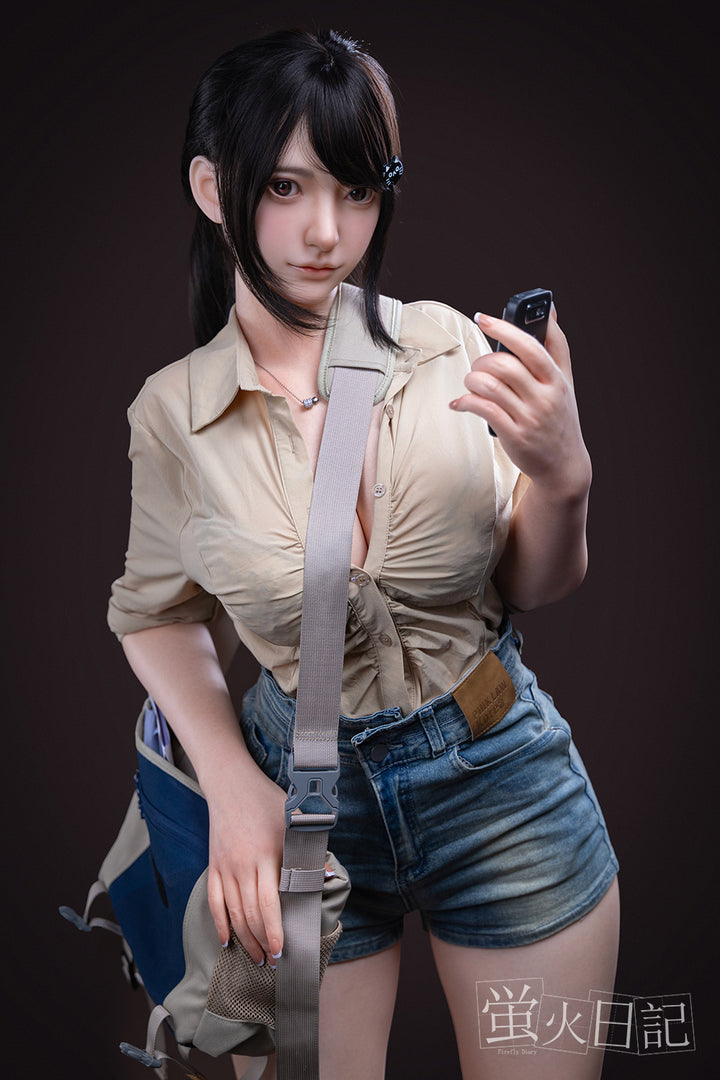 Firefly Diary 164 cm silicone doll Lian V2 wearing a beige shirt and denim shorts, showcasing realistic features and lifelike skin.