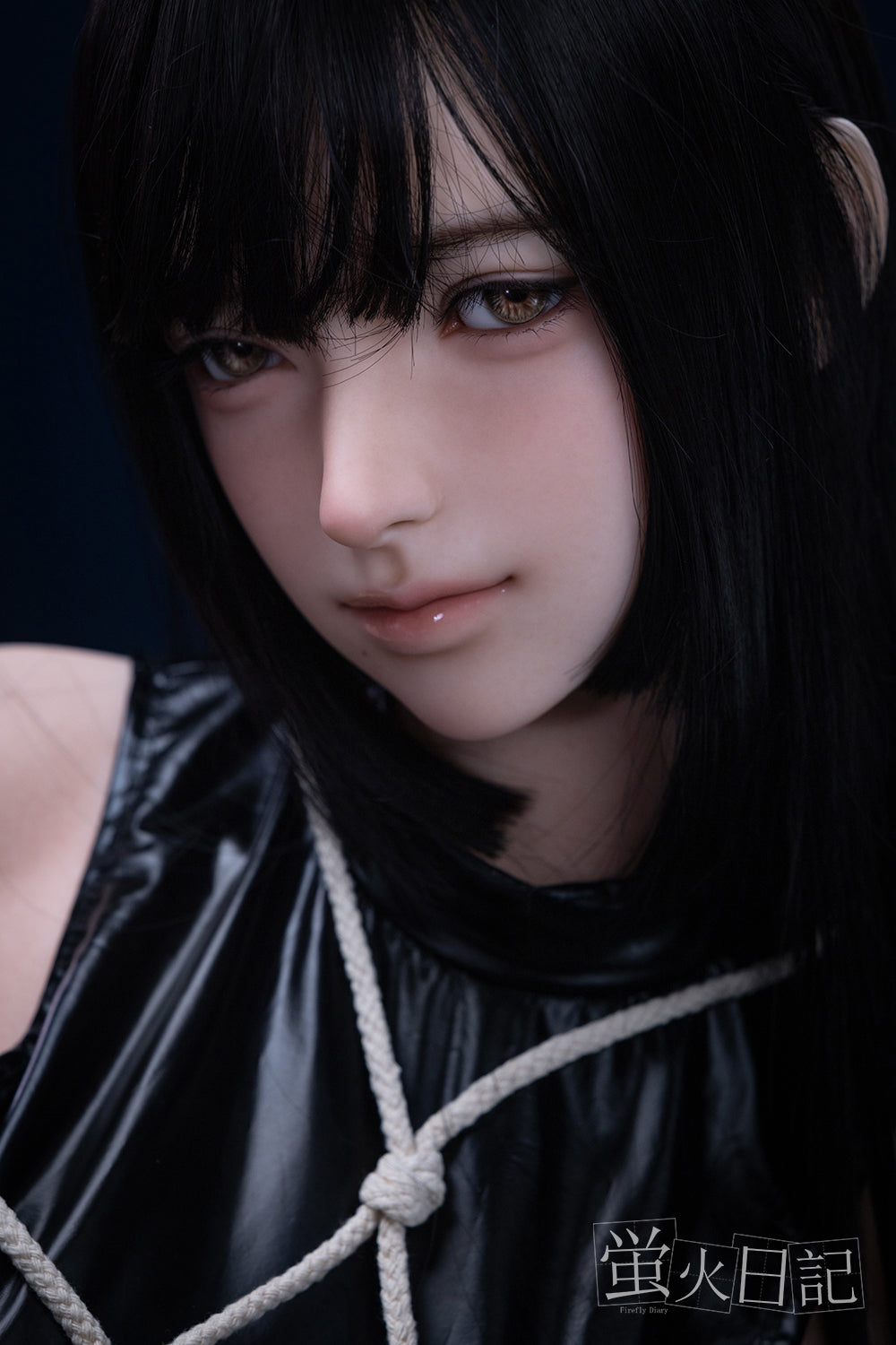 Firefly Diary 162 cm silicone sex doll – Linglong model close-up, realistic face with long black hair, wearing black rope harness.