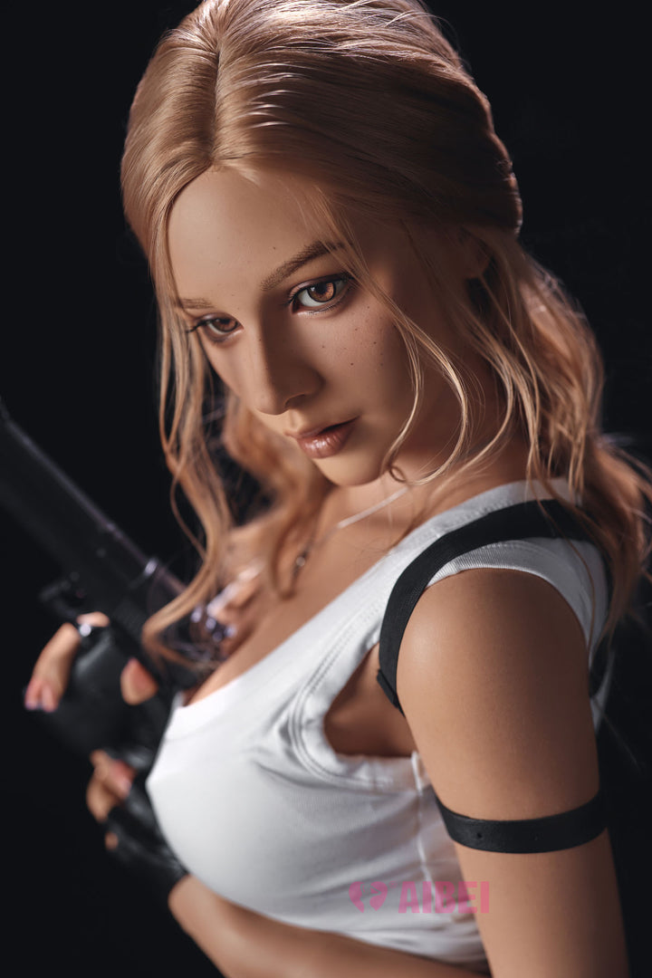 Close-up shot of Aibei Doll 150 cm F Silicone - Clara wearing a white tank top and holding a gun.