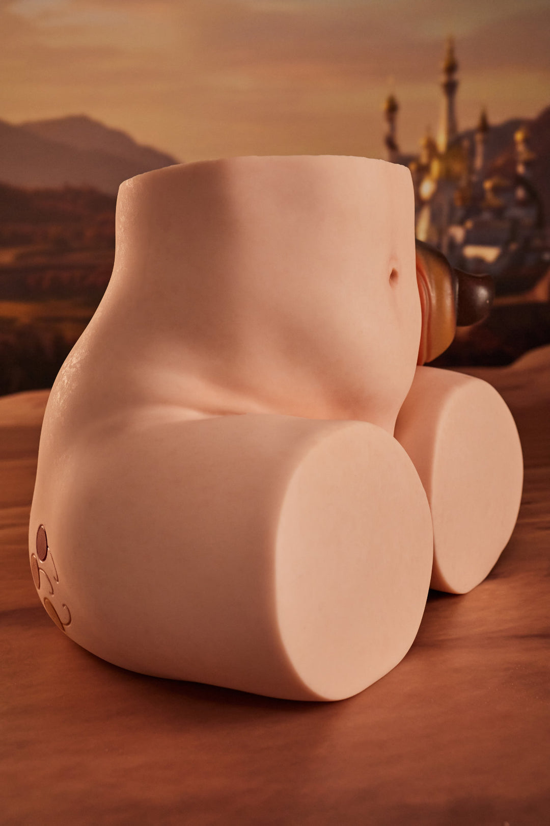 CLIMAX DOLL - PA-Peppy Silicone Butt Torso (Cinnamon) full rear view showing buttocks and back torso, desert ruins background
