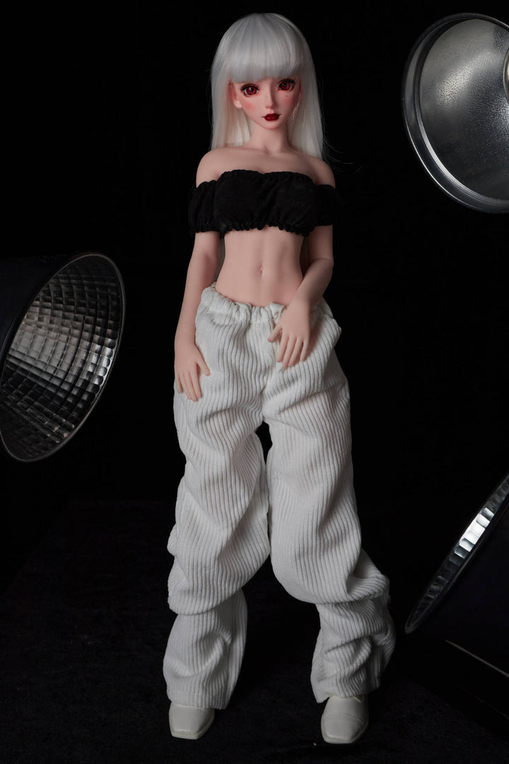 CLIMAX DOLL Mini J60 cm Hybrid - Saki (Cinnamon) – relaxed full-length pose against a dark studio backdrop