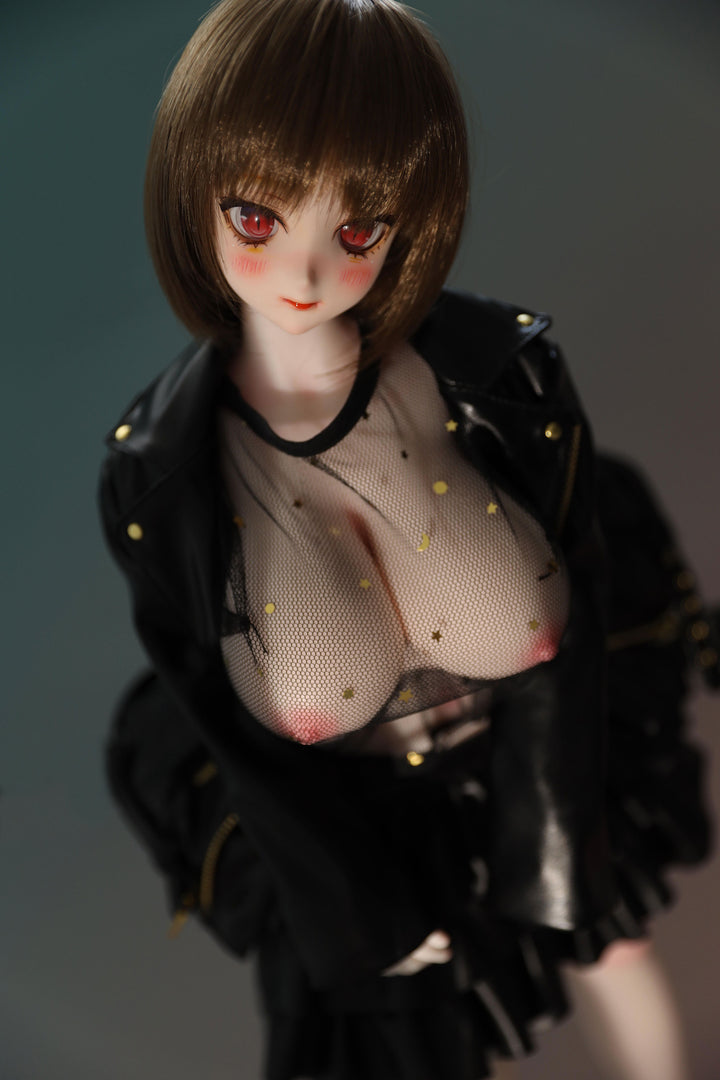 CLIMAX DOLL Mini J60cm P Hybrid - Zella (White) - Close-up with the black jacket open over the sheer black top, bust in soft focus, short brown bob, quiet inviting expression, teal-green backdrop.