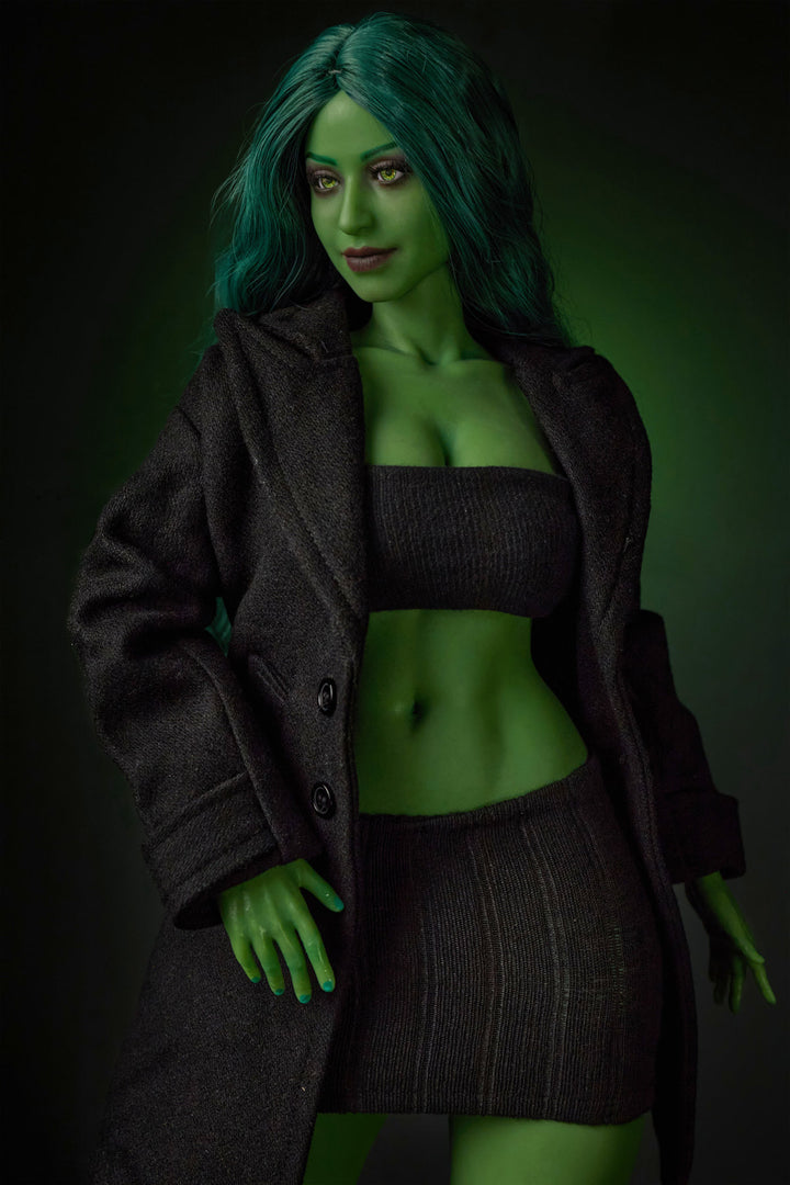 CLIMAX DOLL Mini Si70cm KA Silicone - Renee (Green) full body front view in black crop top and mini skirt, long green hair, dark green studio background