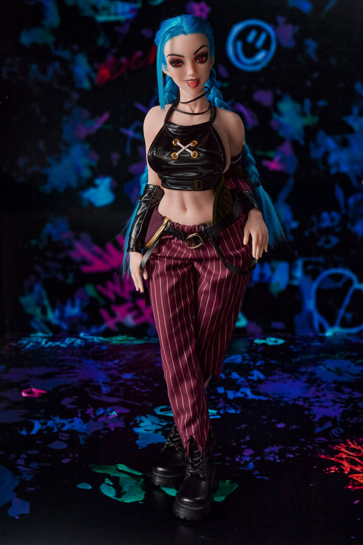 CLIMAX DOLL Mini Si70cm MO Silicone - Jetta (Cinnamon) full body front view in black crop top and red plaid pants, blue hair, dark bokeh background

