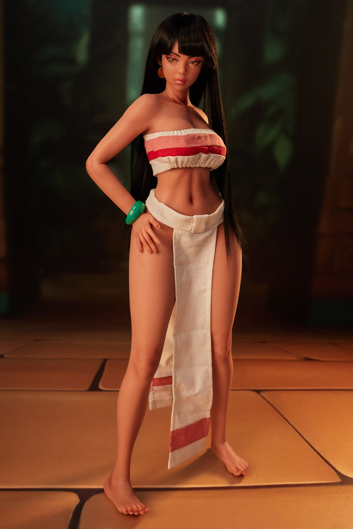 CLIMAX DOLL Mini Si70cm MO Silicone - Roxy (Black) rear view in red and white tribal bikini top and wrap skirt, short dark hair, warm temple indoor background

