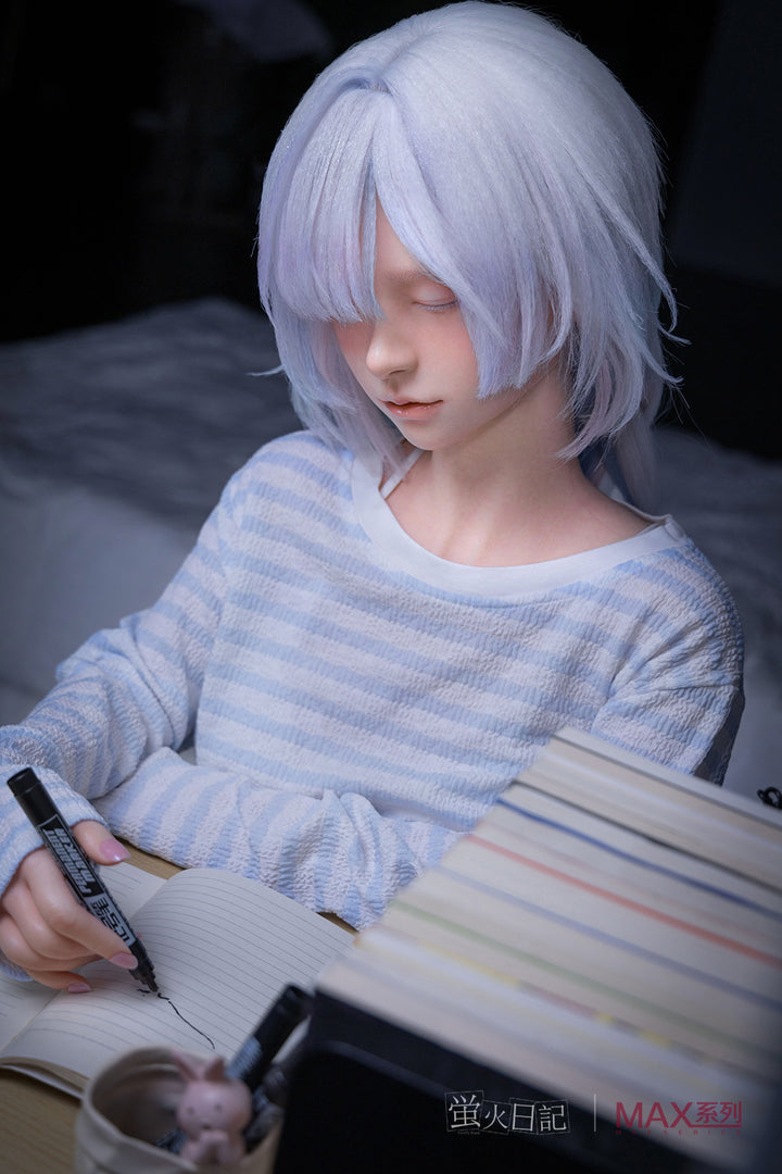 Firefly Diary Doll 153 cm A Max Series Silicone - Liuli V2 with light-colored hair wearing a striped sweater, sitting and writing in a notebook.