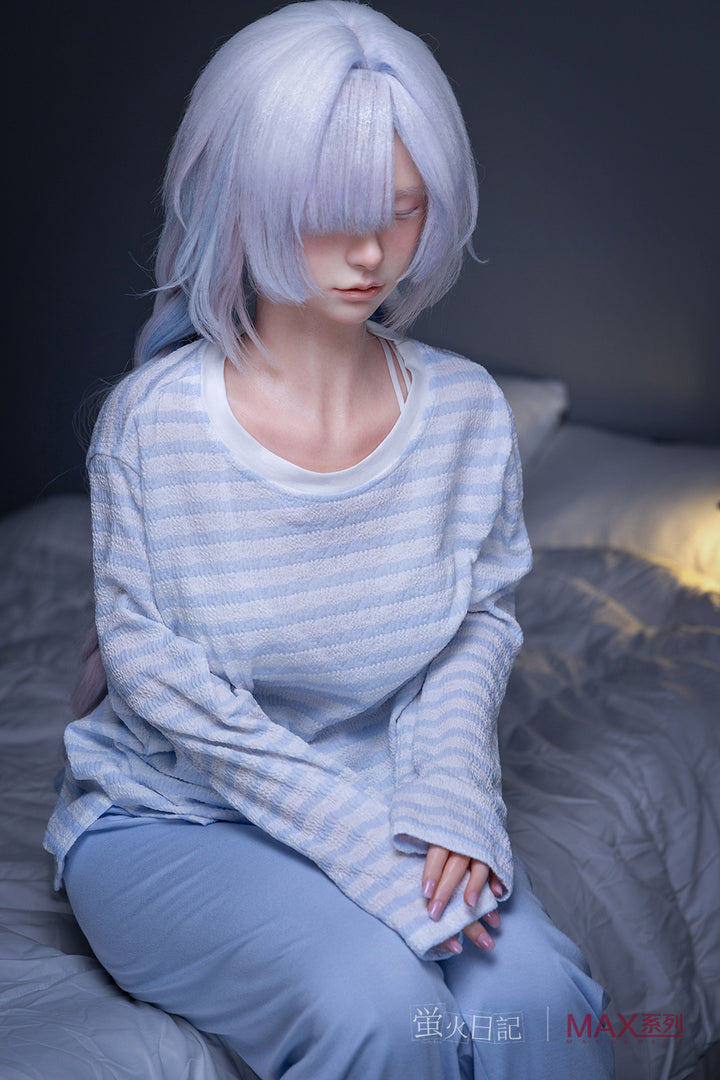 Firefly Diary Doll 153 cm A Max Series Silicone - Liuli V2 with light blue hair wearing a striped shirt sitting on a bed.