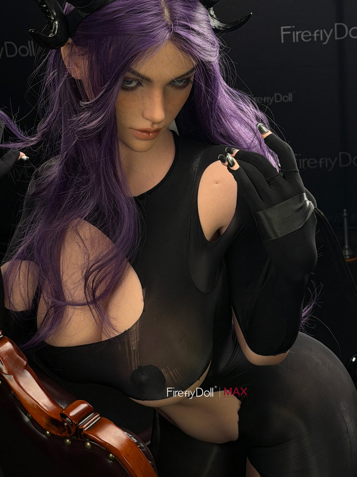 Firefly Diary Doll 164 cm I-cup Max Series Silicone - Mary seated with one arm raised above her head, fitted black gothic outfit, dark atmospheric lighting