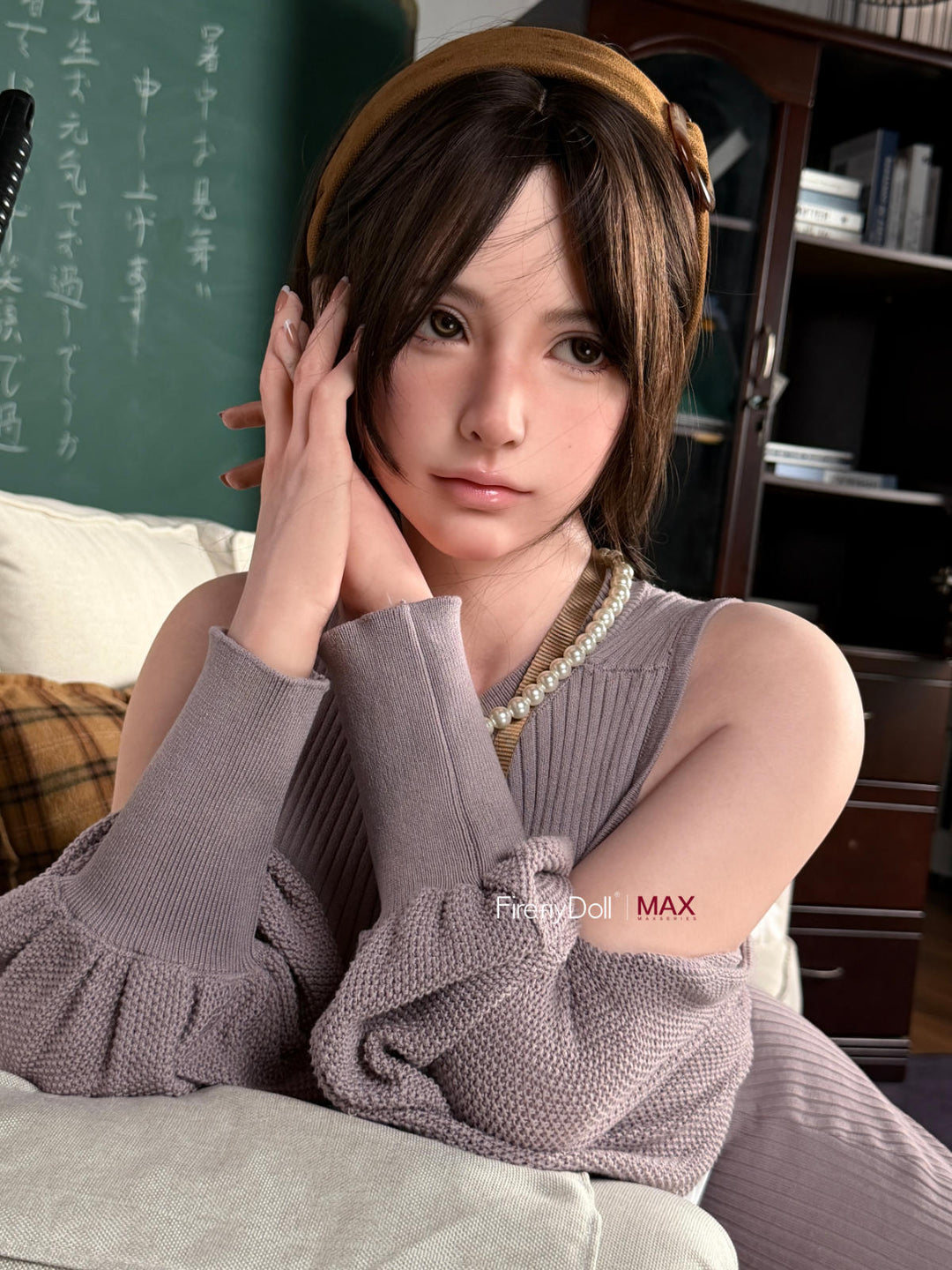 Firefly Diary Doll 165 cm B Max Series Silicone - Haruko V2 seated close-up in a gray knit sweater dress, hand near her hair
