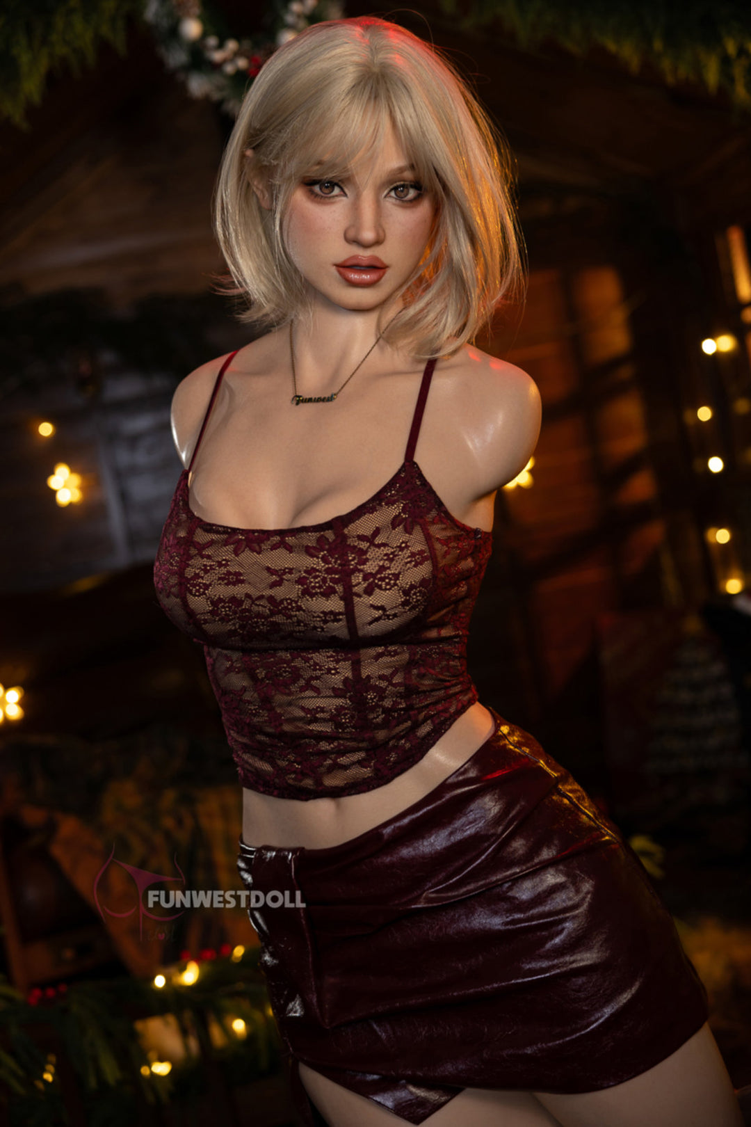 FunWest Doll 113 cm D FWT Series Silicone Torso - Lyra V2 three-quarter view in red lace crop top and burgundy mini skirt, short blonde bob hair, festive Christmas background
