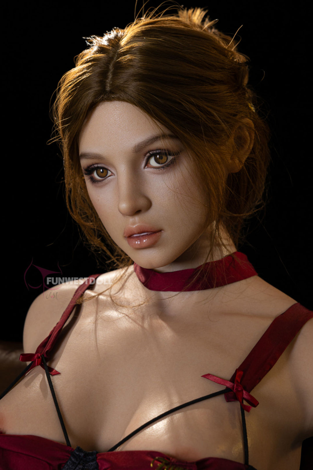 Close-up of the Lyra torso's face and shoulders featuring realistic silicone skin and brown hair.