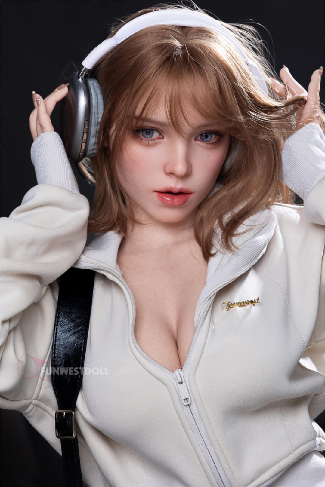 FunWest Doll 152 cm D Silicone - Thalia (Real Skin Texture) – wavy auburn hair and silver headphones, cream zip hoodie worn open