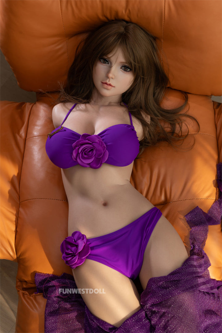 FunWest Doll 95 cm D FWT Series Silicone Torso - Lily in a purple outfit lying on an orange leather couch.