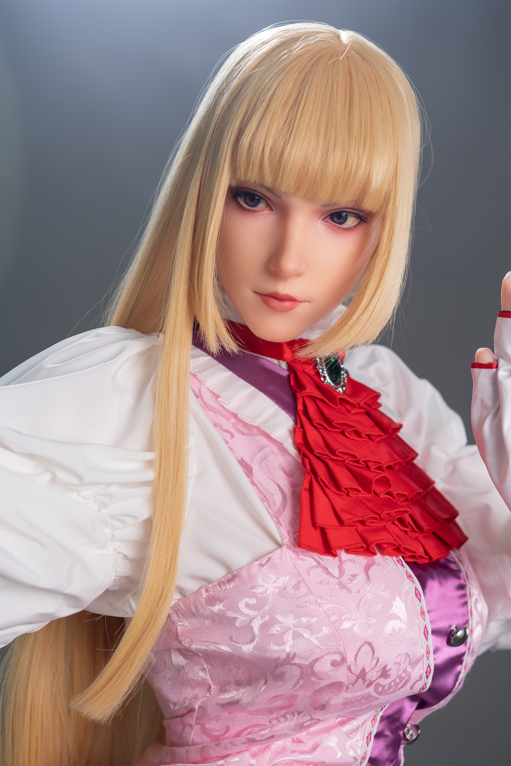 Game Lady 171 cm G Silicone - Lili wearing a white blouse with red accents and a pink skirt.