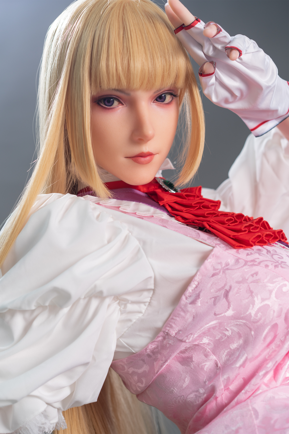 Game Lady 171 cm G Silicone - Lili wearing a white and pink outfit with red accents.