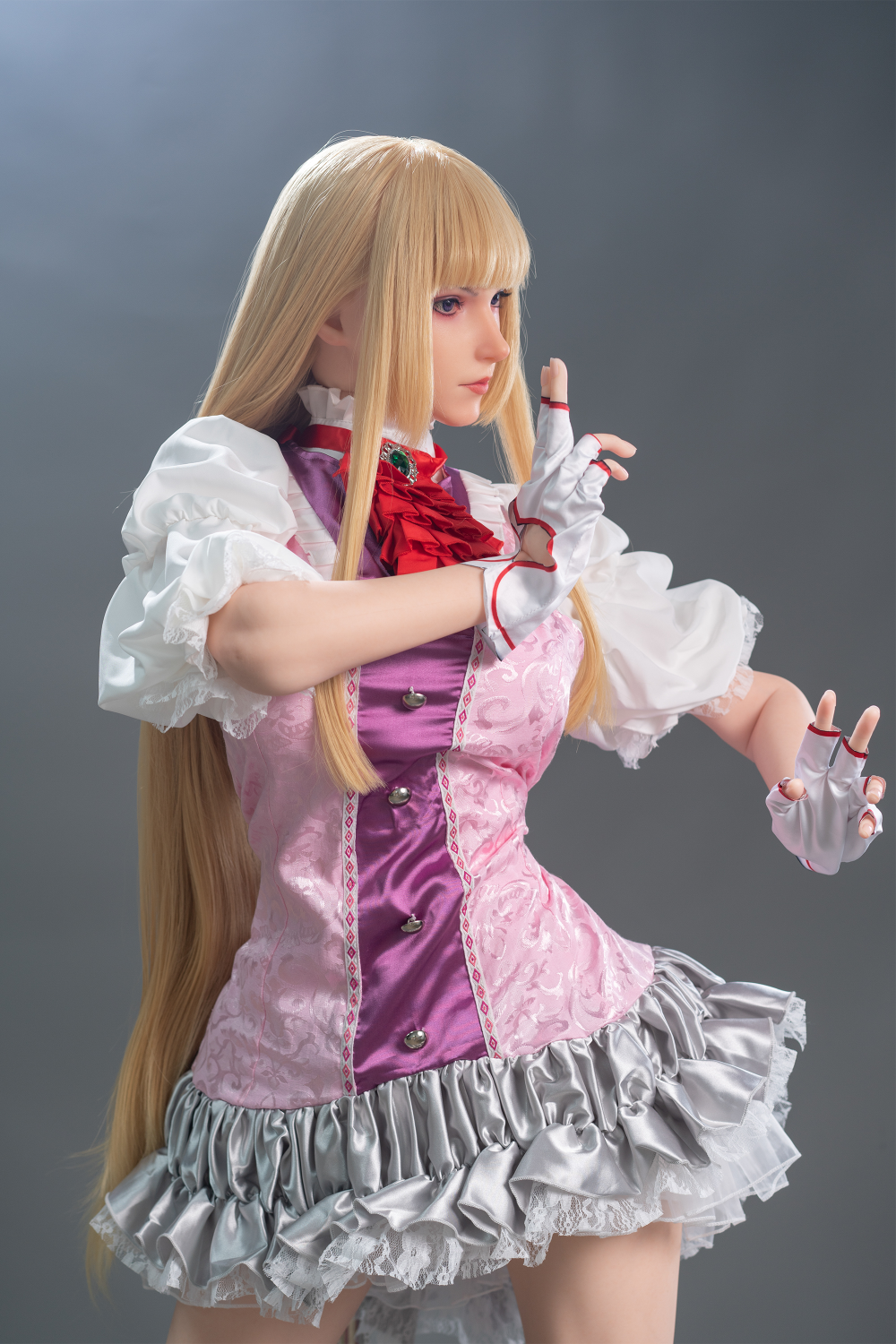 Game Lady 171 cm G Silicone - Lili wearing a detailed costume with a pink and white outfit.