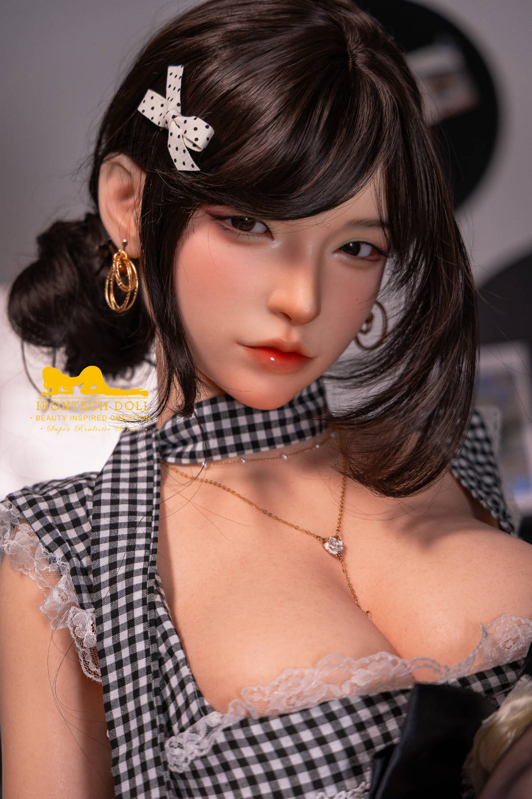 Irontech 165T E Young Series Silicone - Mio – close-up in glasses and gingham top, a soft playful expression