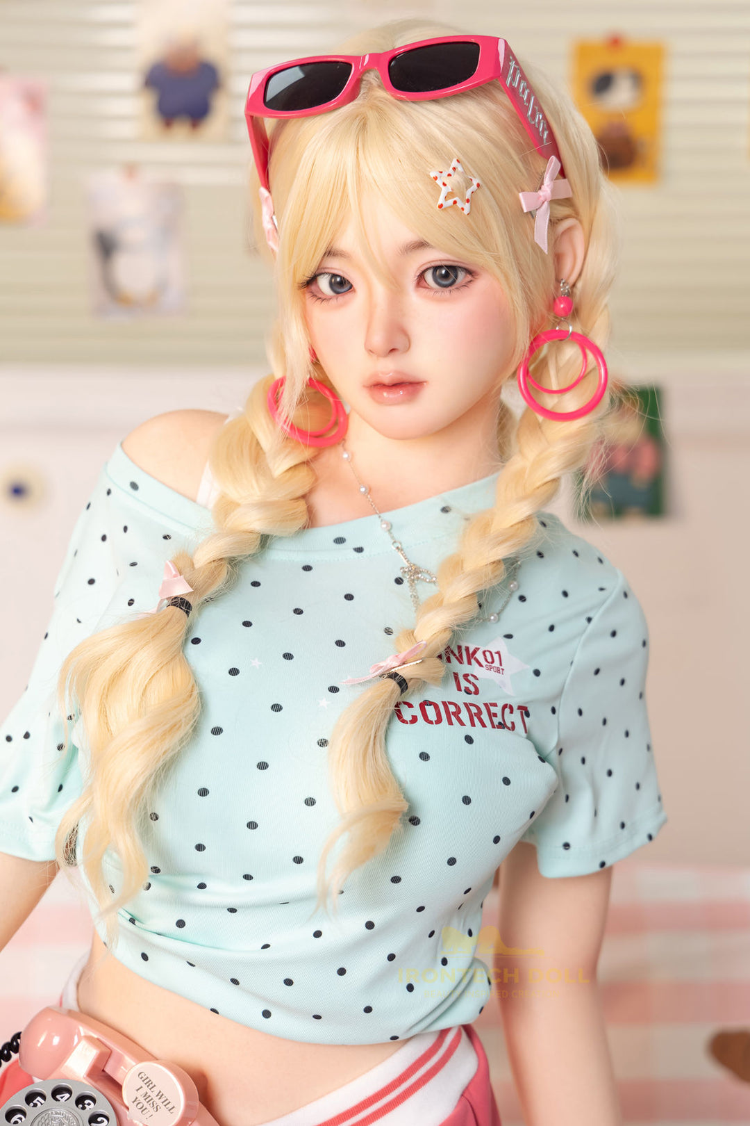 Irontech Doll 148 cm Plus B Silicone - Xia Ying full body side view in light blue polka dot crop jacket and pink skirt with blonde twin buns, bright kawaii bedroom background