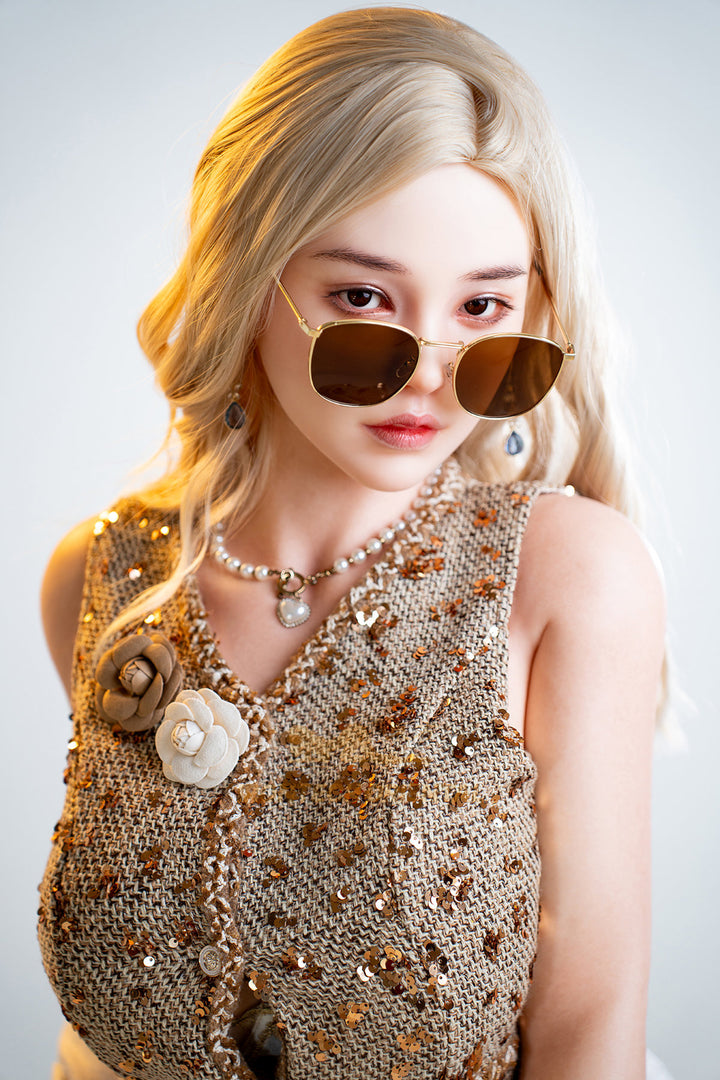 Irontech Doll 158T E Oriental Series Silicone – Eileen seated in round sunglasses and a printed boho dress