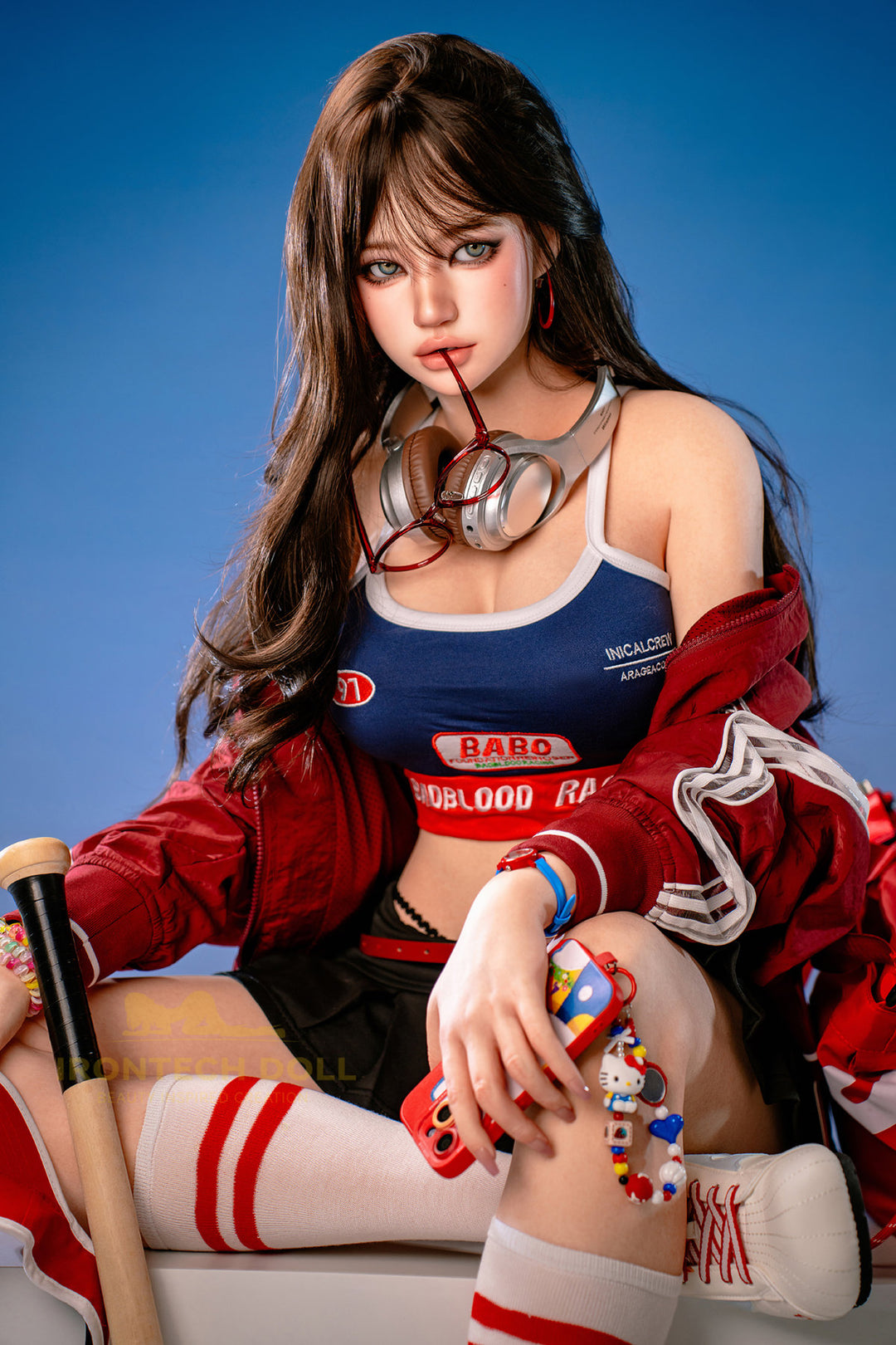 Irontech Doll 161 CM F Silicone - Evie full body front standing view in red and blue racing outfit with cap, highlighting realistic 161cm silicone figure proportions against blue background