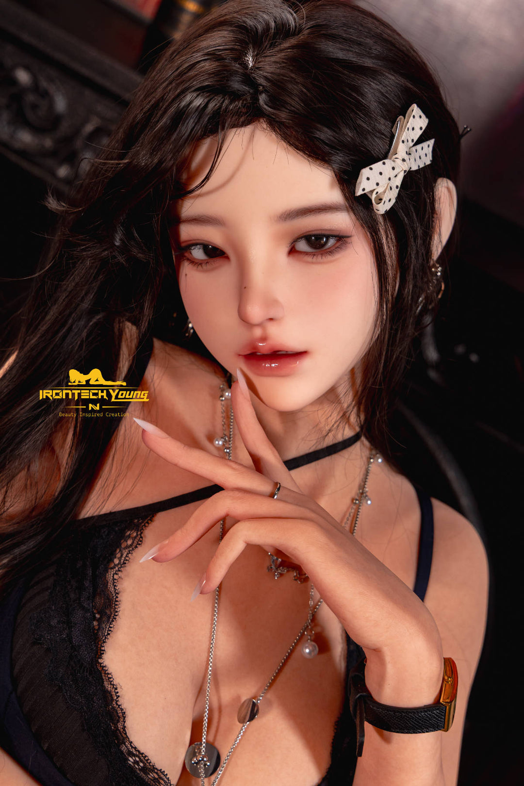 Irontech Doll 166 cm 2.0 Young Series E Silicone - Ria: close-up portrait with long dark wavy hair, a silver bow hair clip and a black choker, wearing a navy slip dress