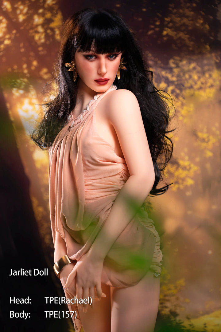 Jarliet Doll 157 cm B TPE - Rachael seated pose with one leg extended, peach satin dress, golden forest backdrop