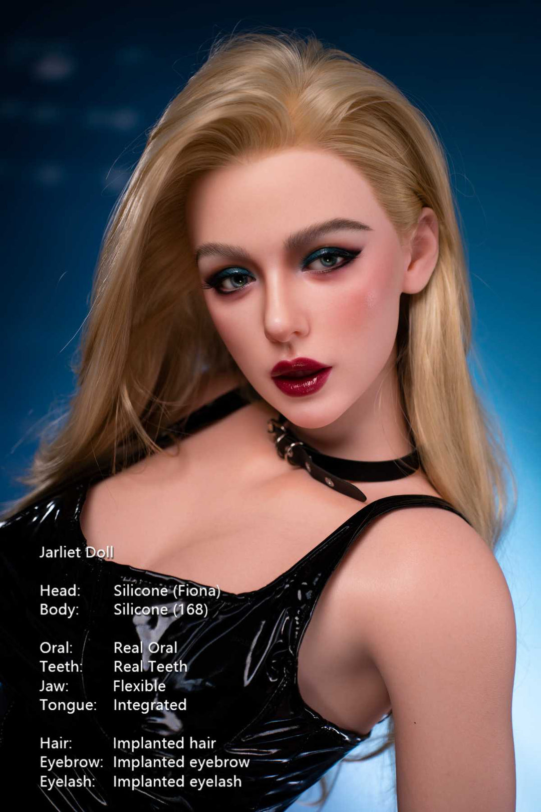 Jarliet Doll 168 cm D Silicone - Fiona wearing a black sleeveless dress with black choker and vinyl top against blue studio backdrop.