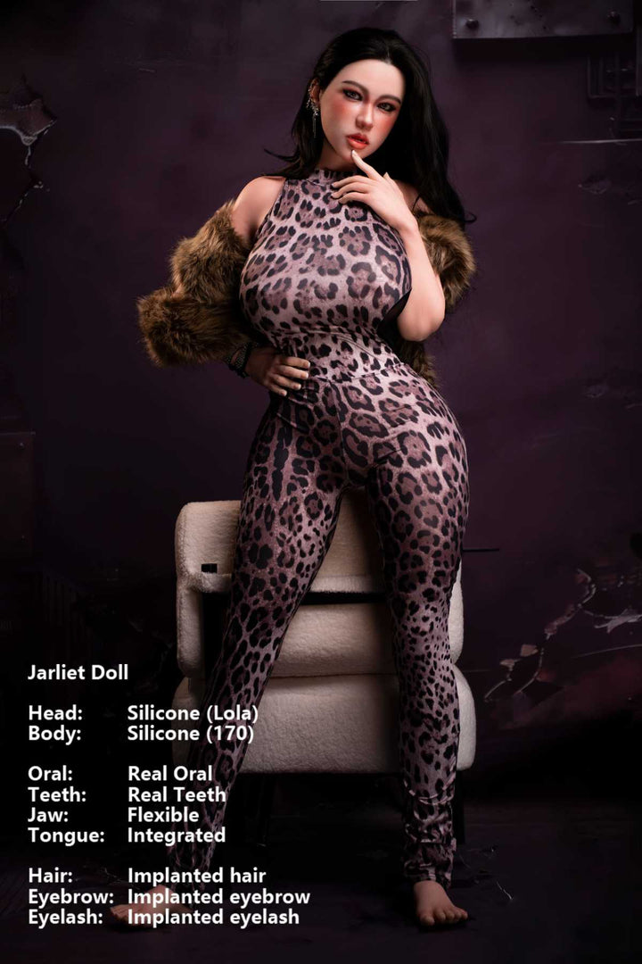 Jarliet Doll 170 cm G Silicone - Lola wearing a leopard print sexy jumpsuit with fur trim, standing hand on hip, against a cracked purple wall.