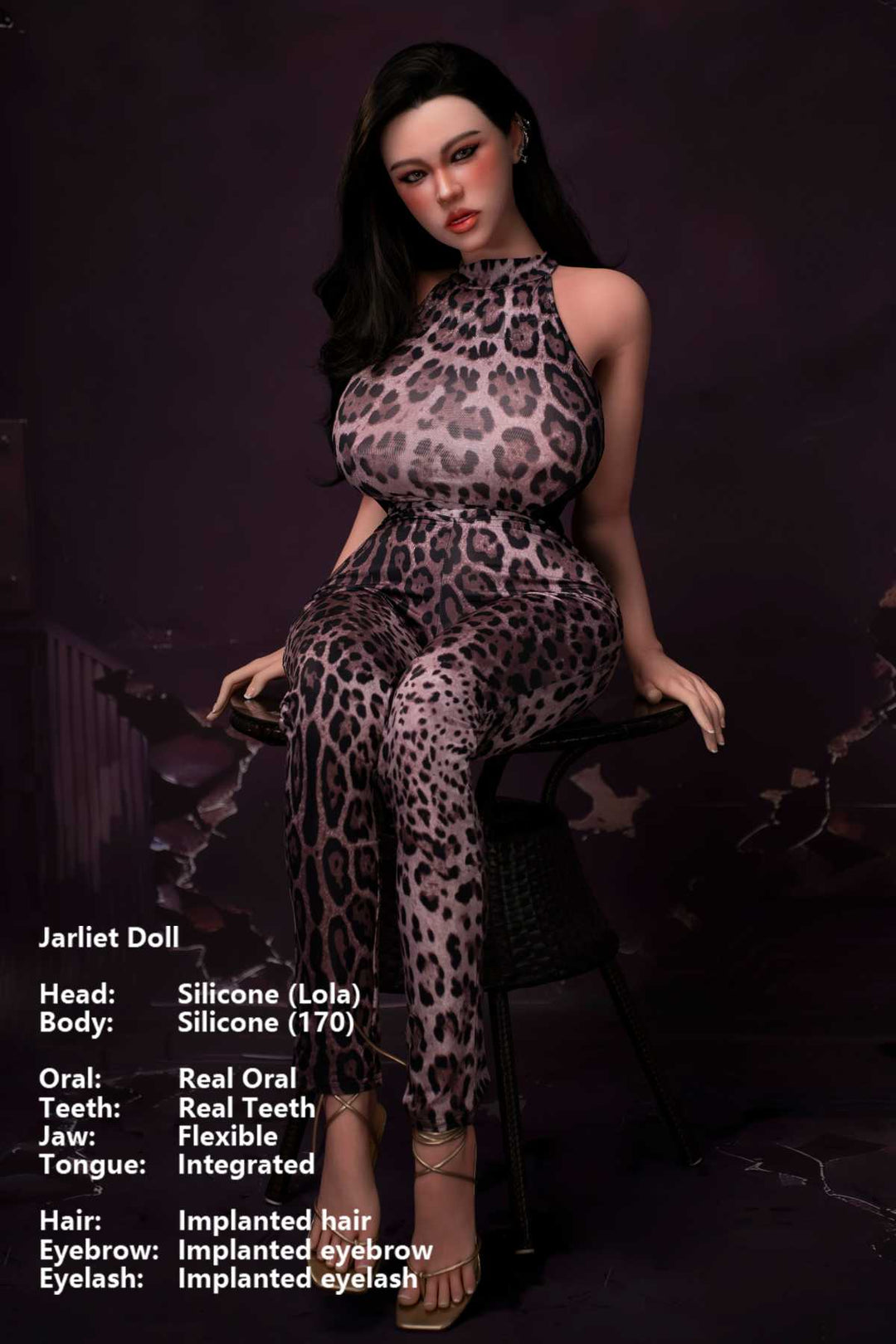 Jarliet Doll 170 cm G Silicone - Lola wearing a leopard print sexy jumpsuit with gold strappy heels, seated pose on wicker table, dark violet cracked background.