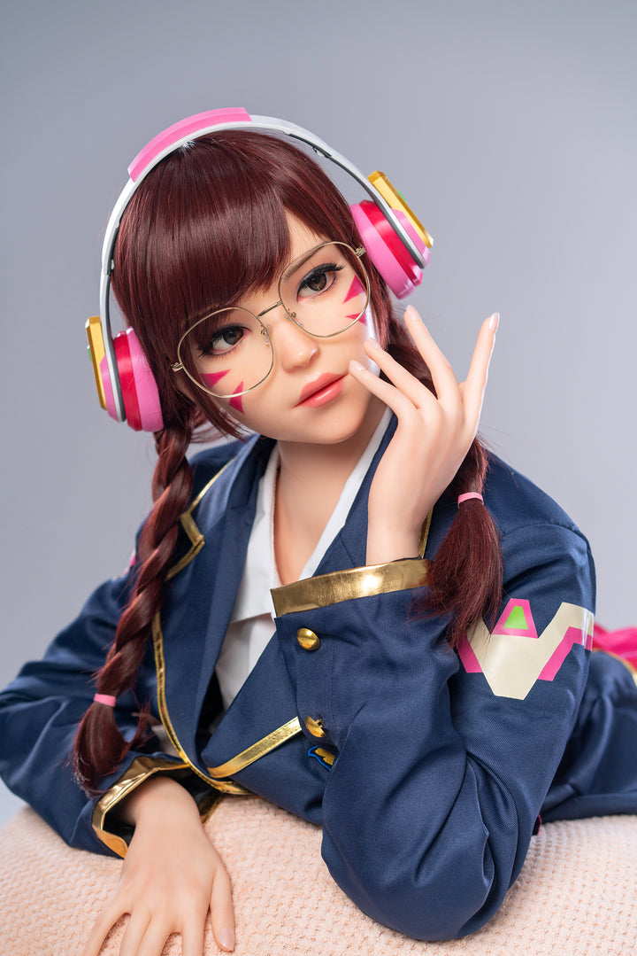 Game Lady 166 cm E Silicone – Dva dressed in a navy blue school uniform jacket with pink headphones and glasses, featuring detailed facial features and braided hair.