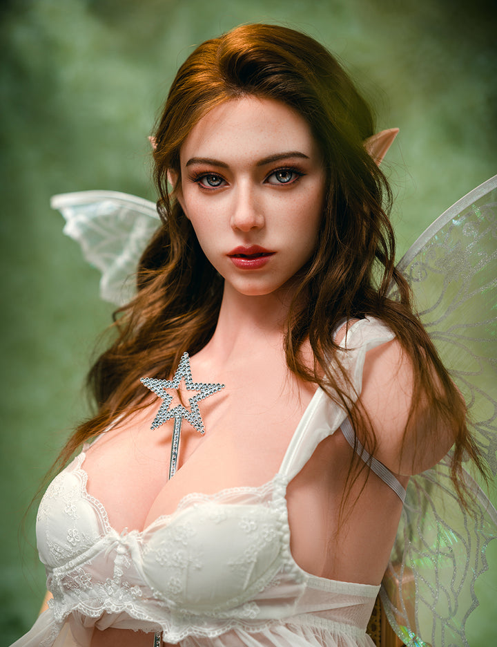 Realistic silicone torso doll named Lindsay from TOP-CYDOLL, 110 cm E-cup model, shown with long brown hair, elf-like ears, and translucent fairy wings, wearing white lingerie.