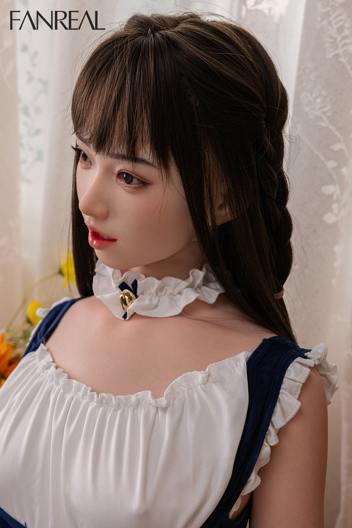 Close-up of FANREAL Doll Molly V3 – 153cm B-Cup Realistic Silicone Sex Doll’s face and upper body, showing detailed features and a blue and white maid outfit.