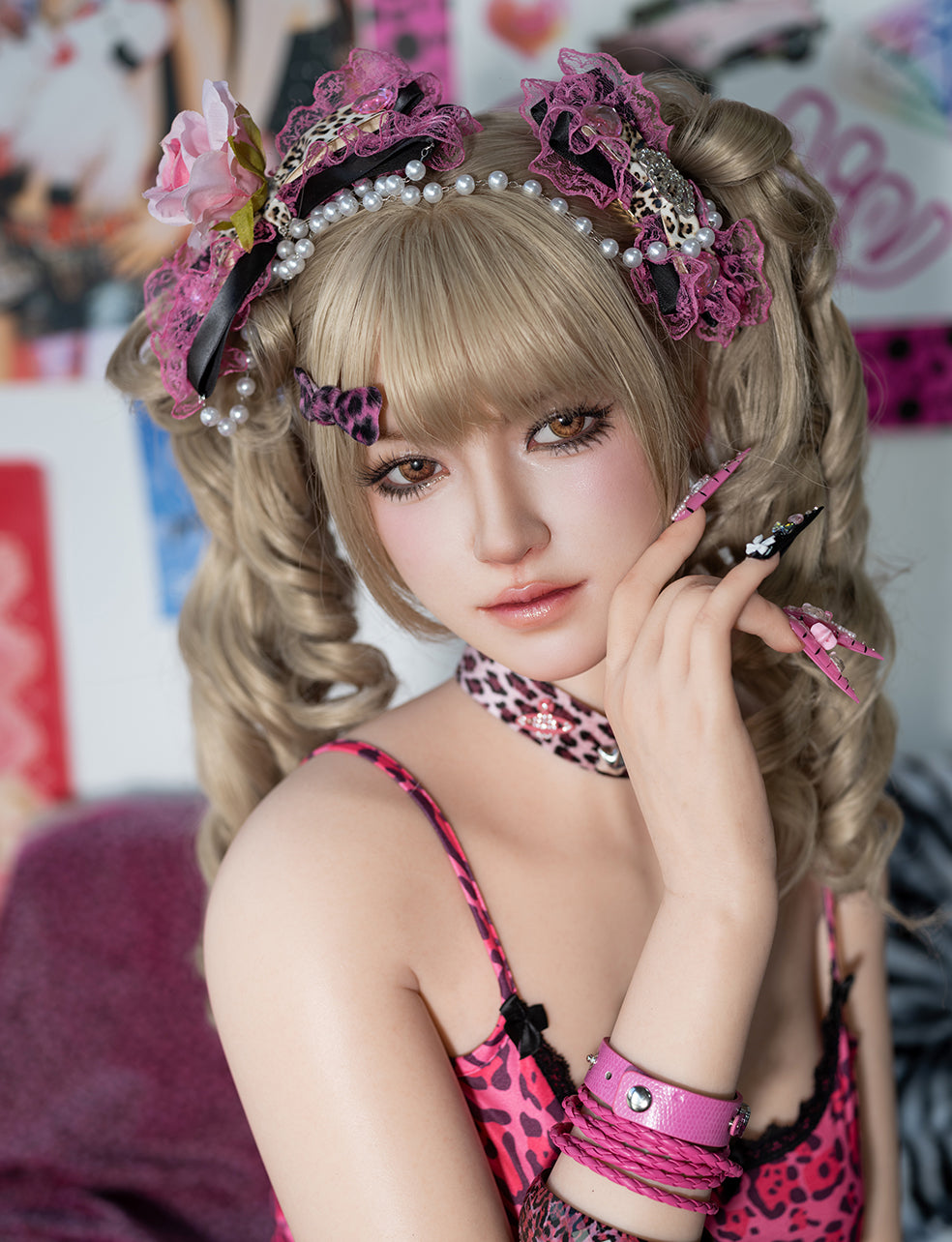 Close-up of the TOP-CYDOLL 162 cm E-Cup Mai Realistic Sex Doll featuring blonde pigtails, pink leopard print accessories, and long decorative nails.