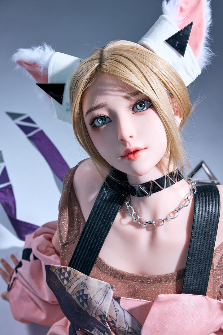 Close-up portrait of Starpery 171 cm D - Luli showing facial details, cat-ear headband, and silver chain necklace.