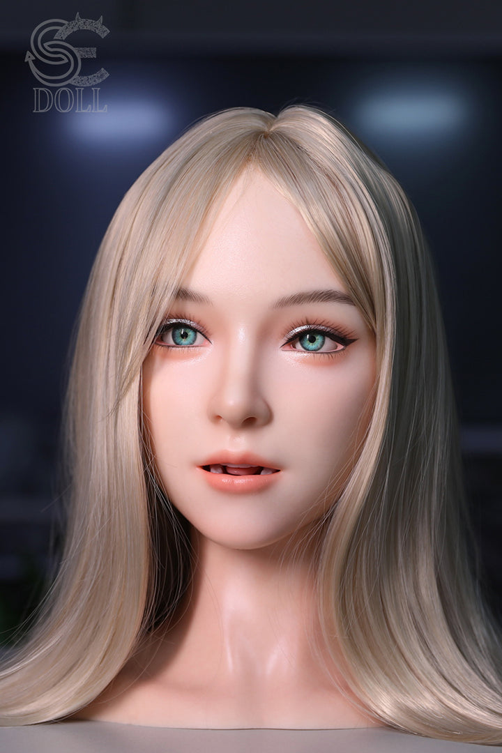Close-up of SEDOLL SE X-Bot AI head with long blonde hair against a dark background