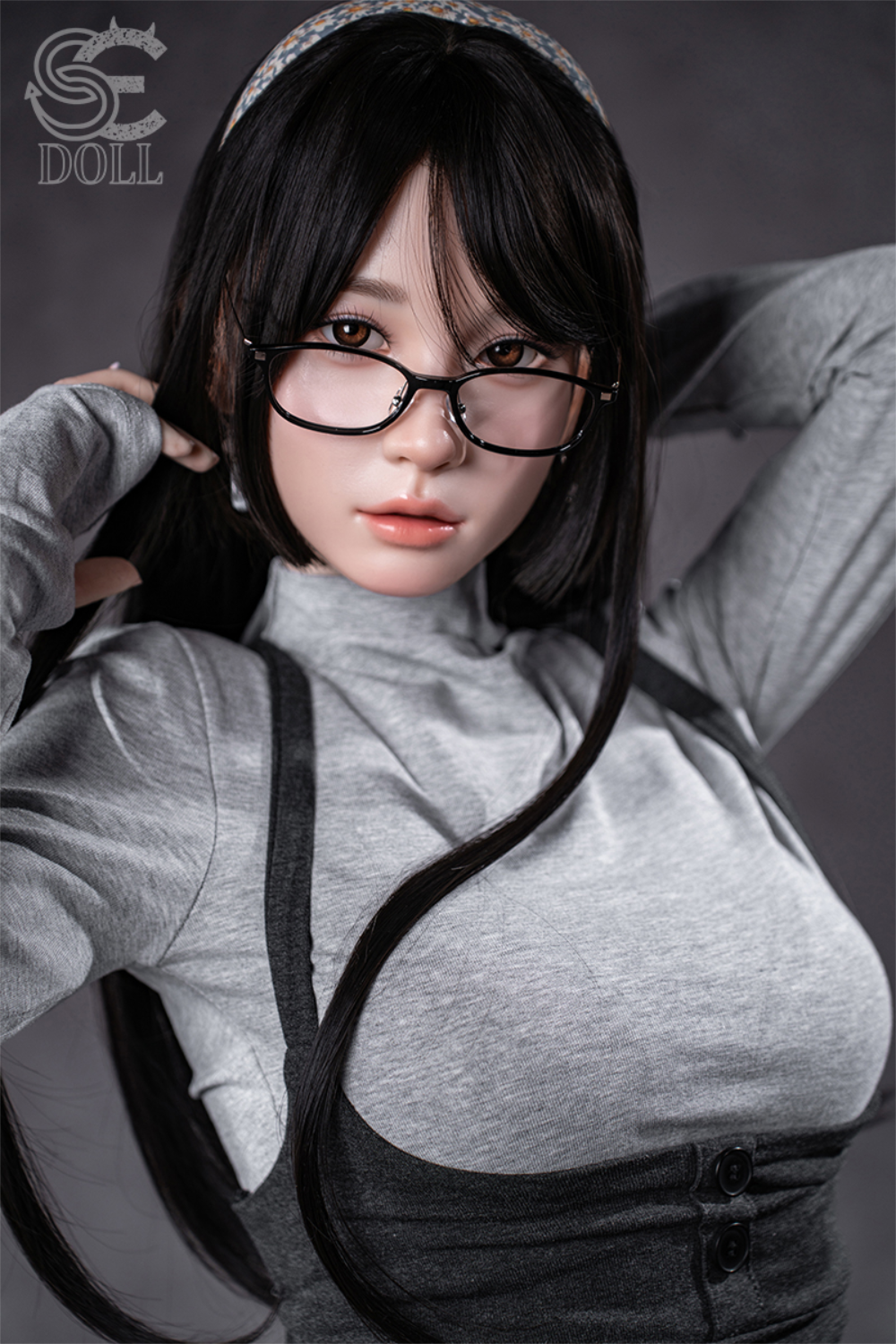 SEDOLL T153 cm A Aya Series Silicone -  Hinata.A wearing glasses and a gray outfit with suspenders.