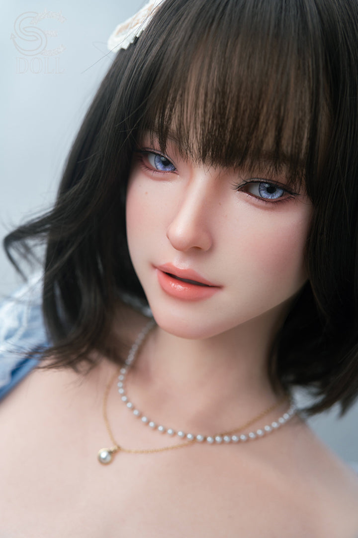 SEDOLL T153 cm A Aya Series Silicone - Shion.A upper body front view in blue lace bralette with pearl necklace, short dark bob hair with bangs, bright indoor background
