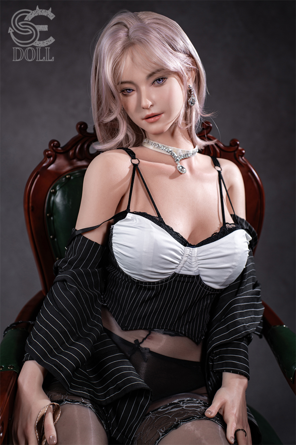 SEDOLL T160 cm C Aya Series Silicone -  Shion.B wearing a black and white outfit sitting on a wooden chair.