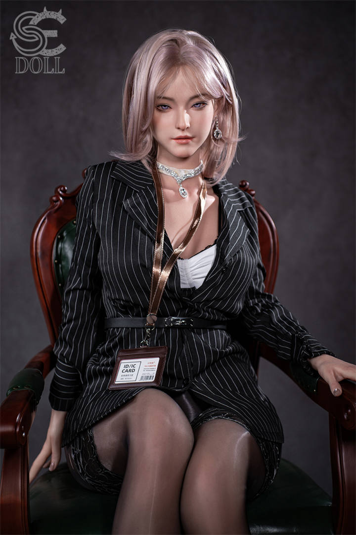 SEDOLL T160 cm C Aya Series Silicone -  Shion.B in a black pinstripe suit sitting on a chair.