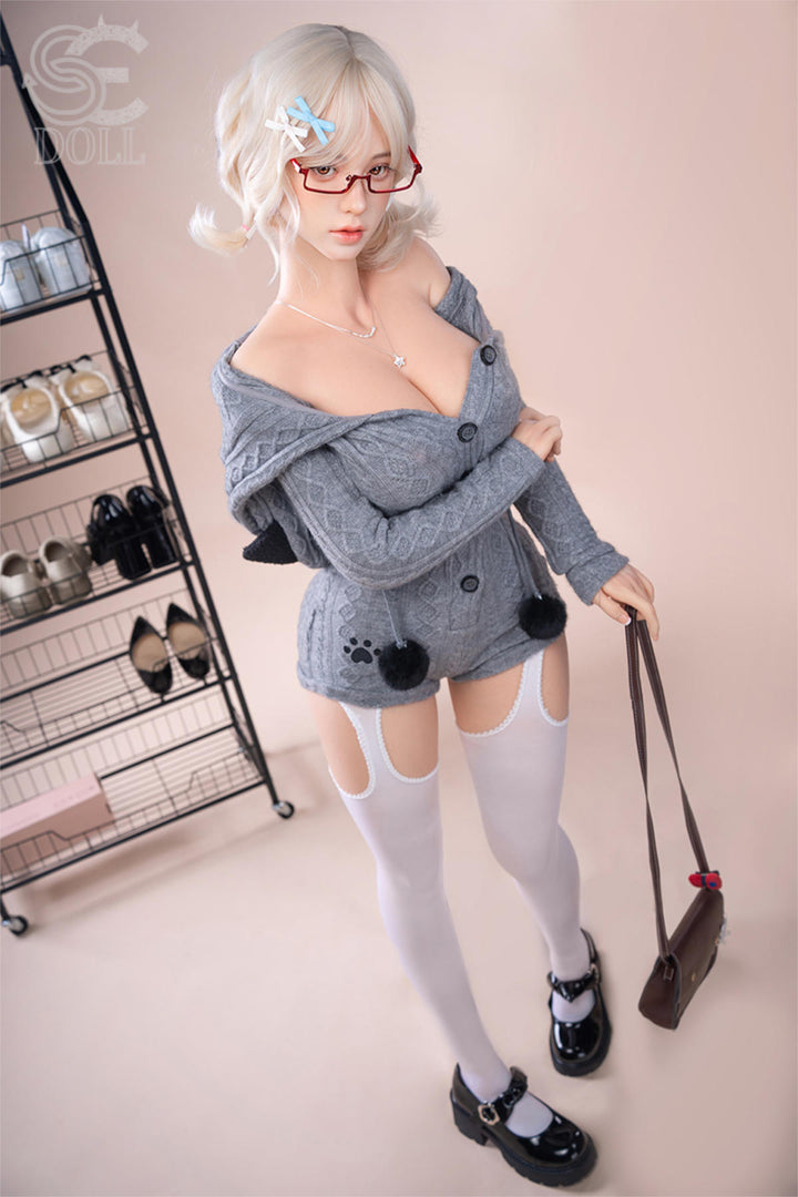 SEDOLL T161 cm C Aya Series Silicone - Miki.B standing pose with her off-shoulder sweater slipping down, thigh-high stockings visible