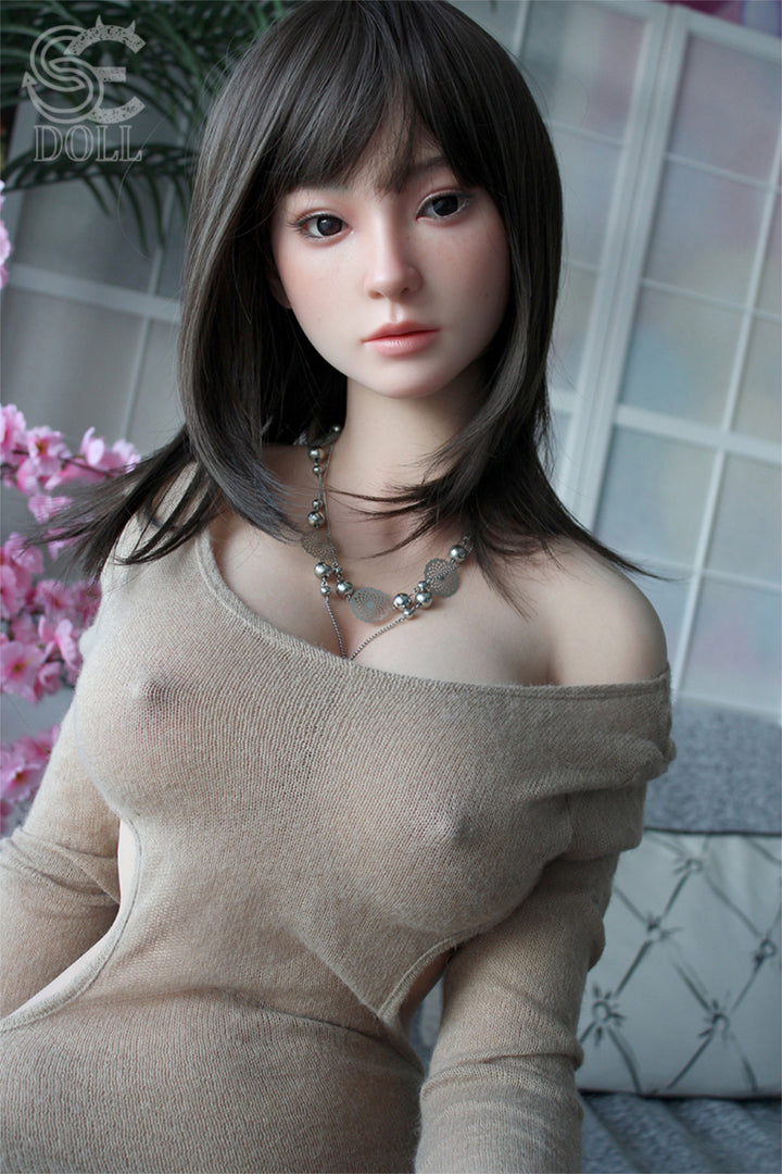 SEDOLL T161cm C Aya Series Silicone - Miori.C – Close-up nude torso pose highlighting realistic skin texture and natural contouring, dark straight-bang hairstyle, softly diffused neutral backdrop.