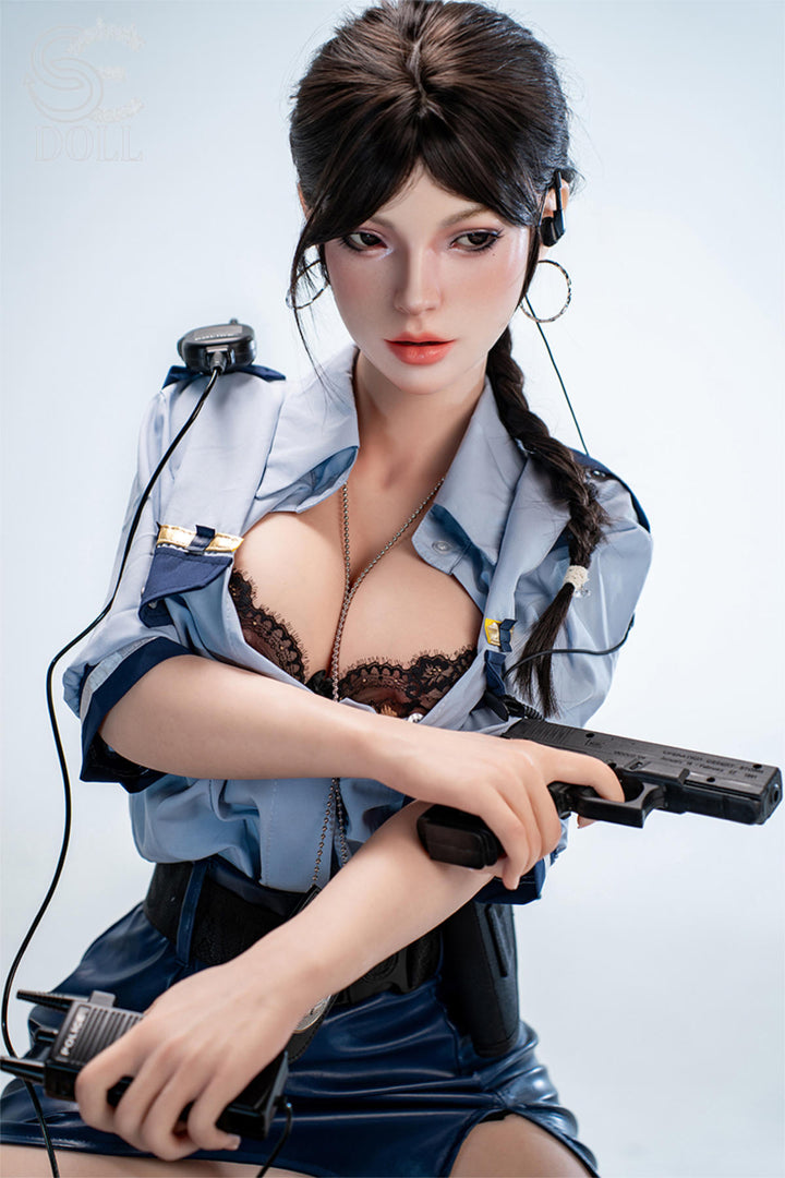 SEDOLL T161 cm C Silicone Pro - Nadia Voss.B close-up holding a prop handgun, denim shirt open, tactical pose