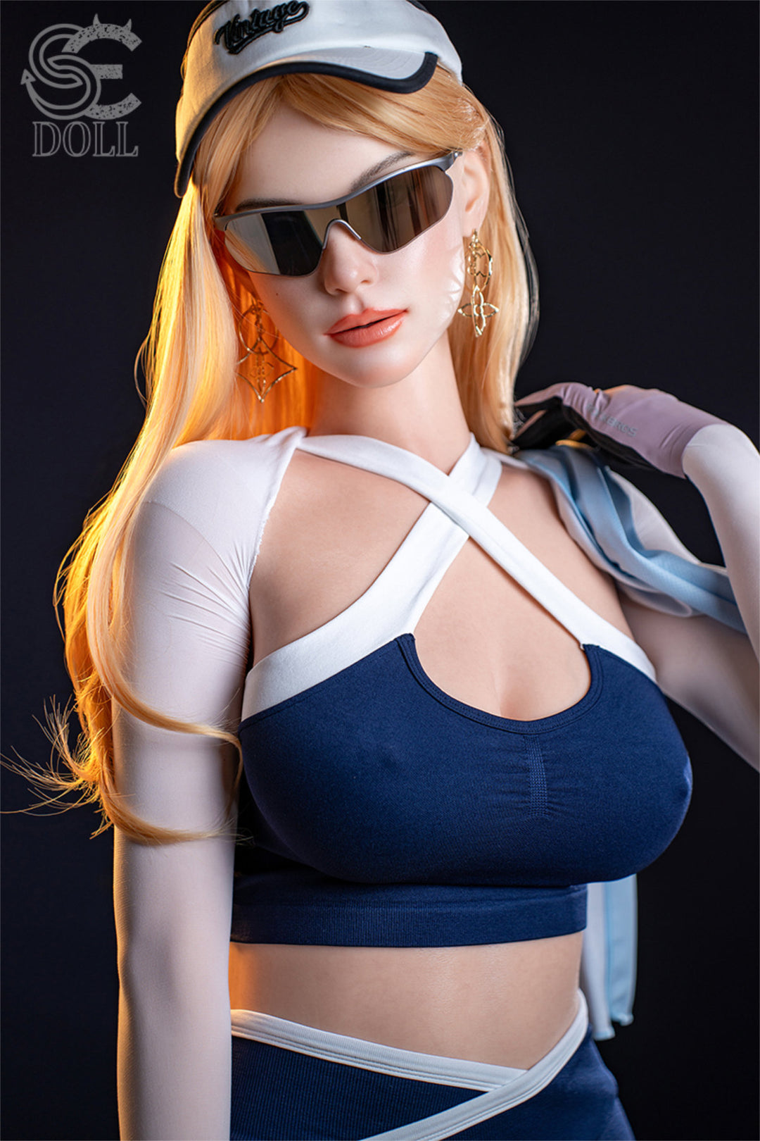 SEDOLL T175 cm E Silicone Pro - Nora.A standing side pose in sunglasses, holding the helmet, navy harness top
