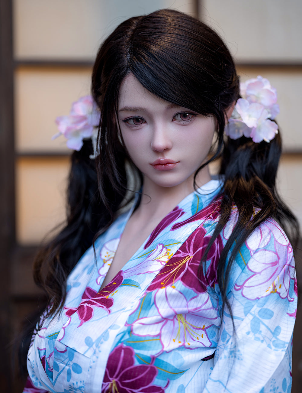 Close-up portrait of the TOP-CYDOLL 162 cm E-Cup Sato Asuka V2 realistic sex doll with pigtails, flower hair clips, and a floral yukata.