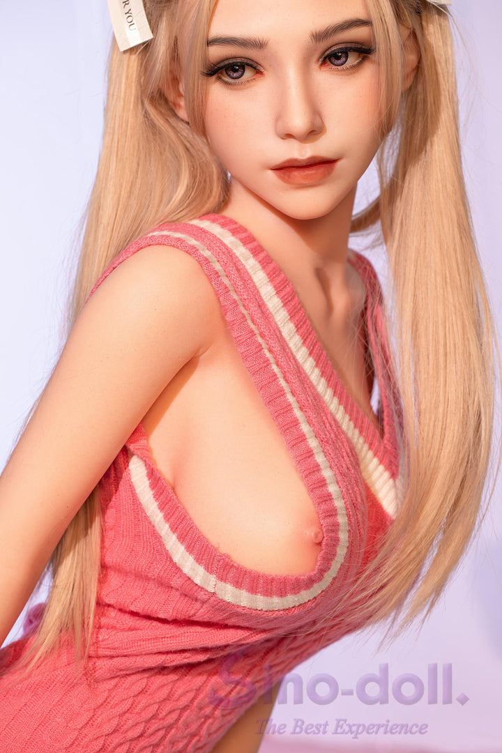 Sino Doll Pro Soft Max 161 cm Platinum Silicone - Aimee (R+S Effect) with blonde hair and pink dress.