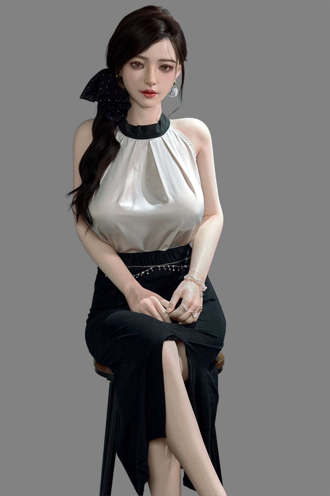 Starpery 171cm D - Asuka Eva – Seated pose, cream halter top with black skirt, dark hair in half-up style, plain grey backdrop.